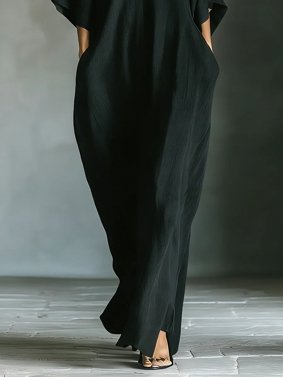 Alessandra • Vestido largo negro oversize minimalista con mangas tipo kimono