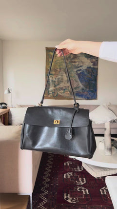 Compact shape leather bag — product video