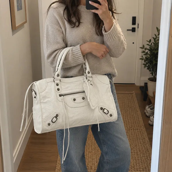 AI-generated image: bag It Girl large, white, in an everyday setting