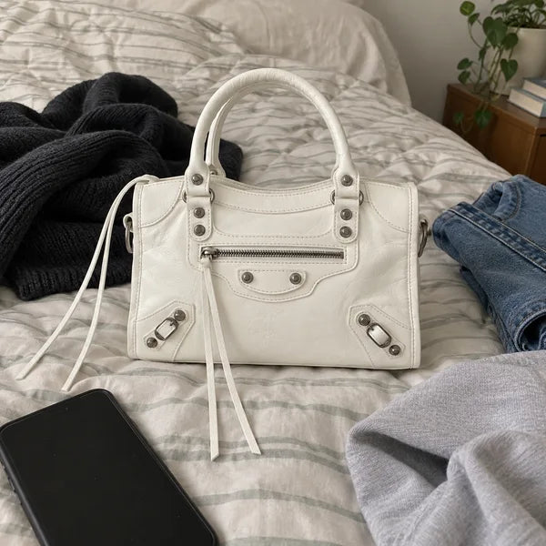 AI-generated image: bag It Girl small, white, in an everyday setting